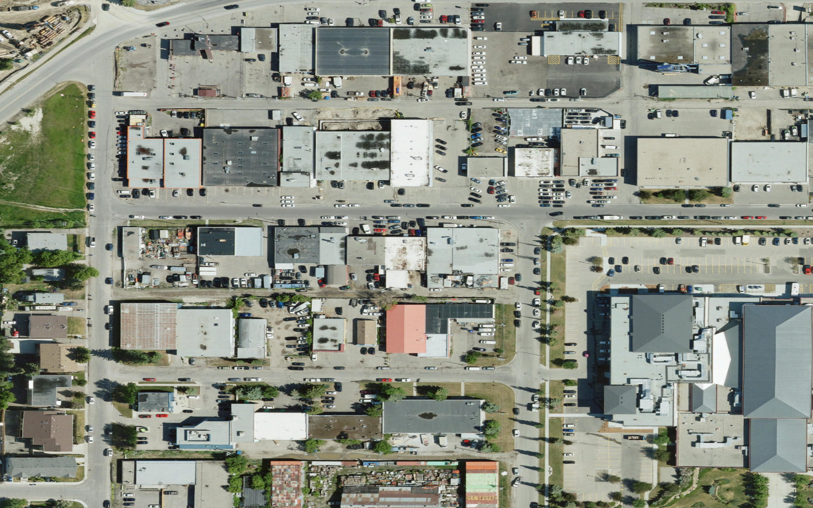 Aerial view of 40 Avenue NE in Greenview Industrial Park, Calgary — the block where Global Auto Repair sits.